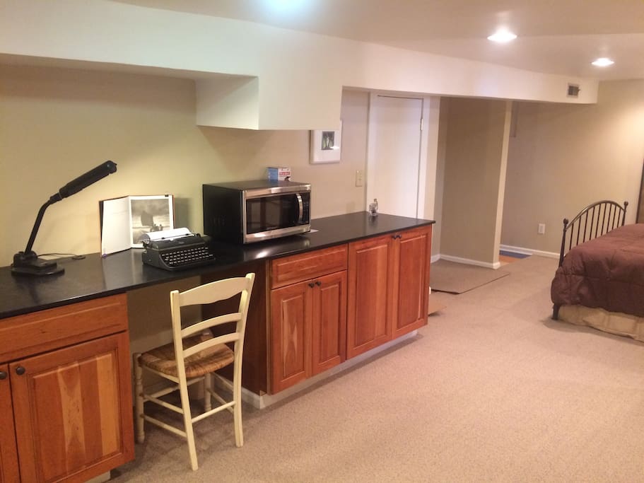 Desk, microwave, and bed!