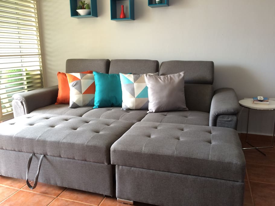 Living room sofa turns into a full bed