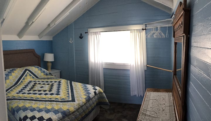 Cama tamaño queen con ventilador de techo