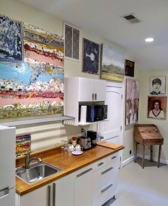 Kitchenette. Full size refrigerator and microwave. Dishware provided.