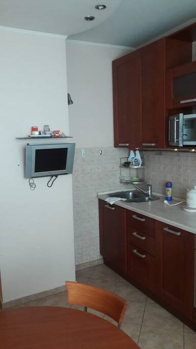 1 table ,5 chairs,Small TV ,microwave , baking oven, washing machine,stove,refrigerator