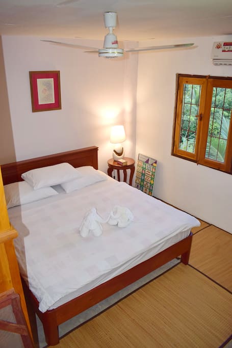 Master bedroom with king size bed as seen from above