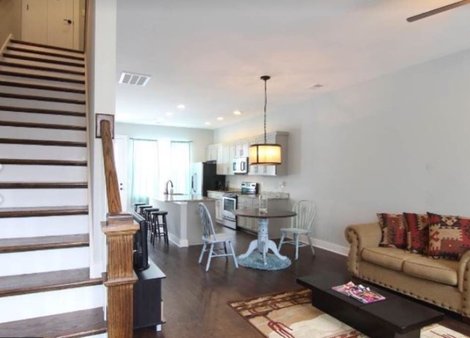 Top Floor has two bedroom with 2 King Size Beds that are super Comfy! Downstairs has a kitchen table plus 4 stools and two couches!