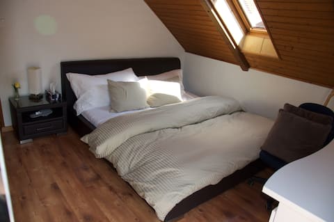 your cozy bedroom in the very heart of Switzerland