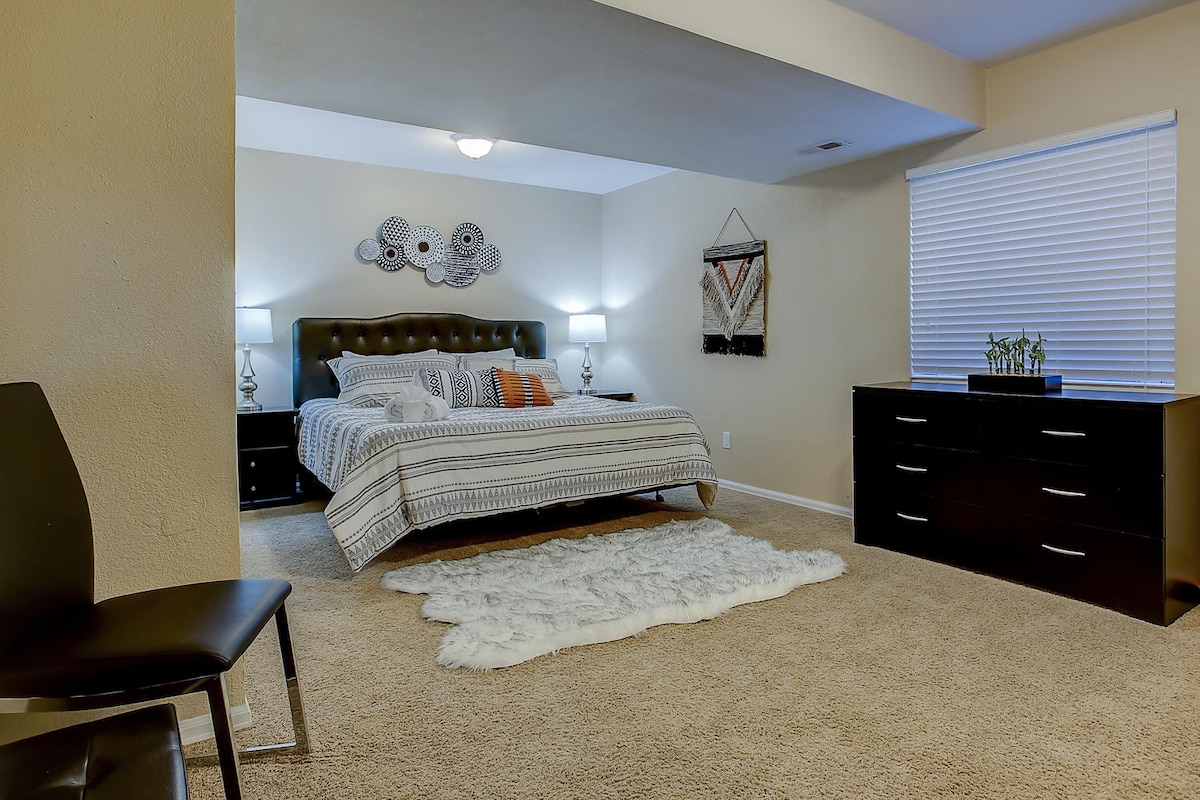 Lower level bedroom with king size bed and closet- conveniently located near bathroom 3