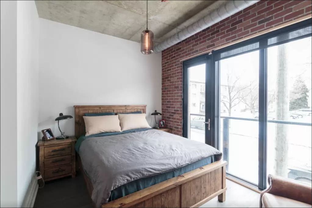 Sunny master bedroom with aircon