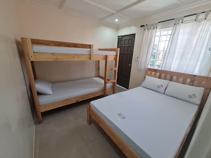 2nd floor air-conditioned room good for 8 pax 