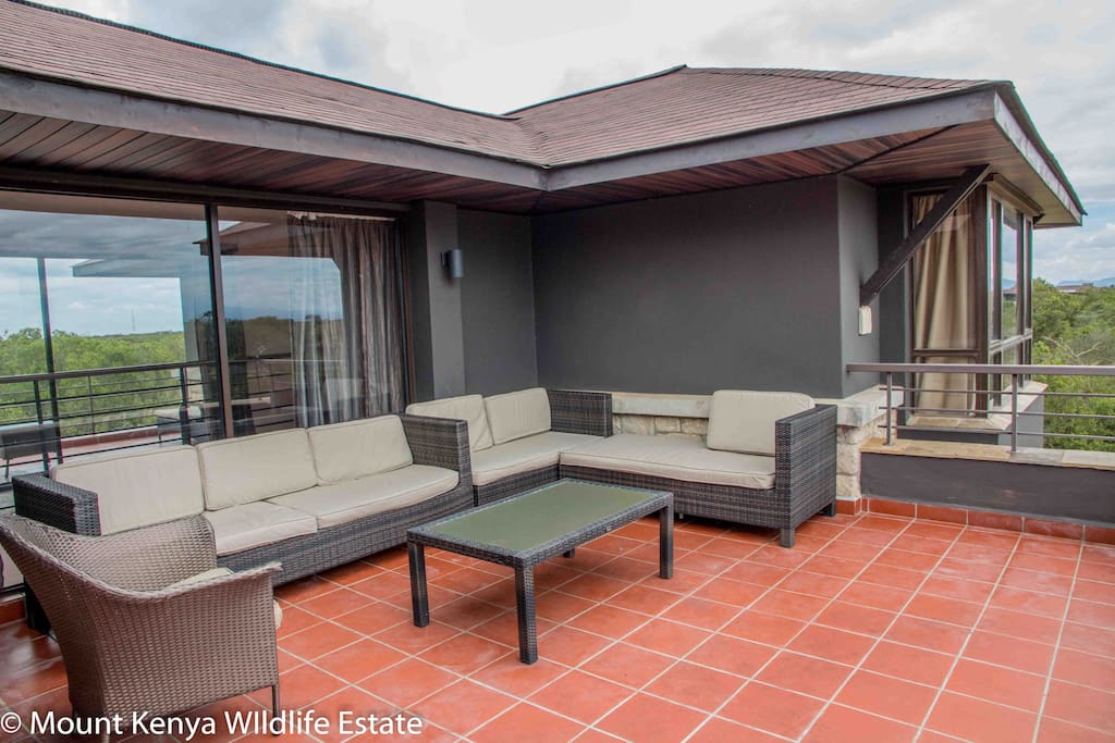 Terrace upstairs with wonderful views of Mount Kenya and a water hole