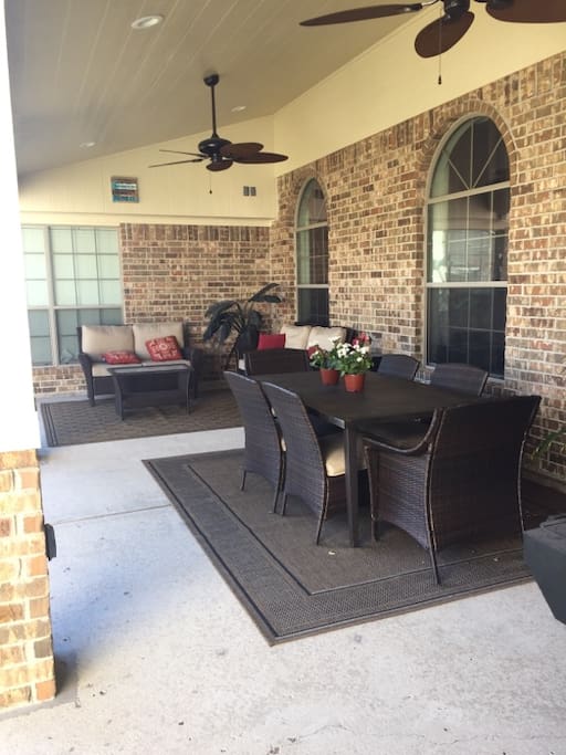 OUTDOOR PATIO W/ GRILL, HEATER, SMALL FRIDGE, ICE CHESTS, DINING, SEATING