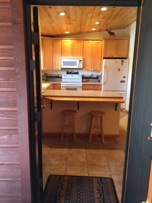 Open entry with large storage/coat closet on left