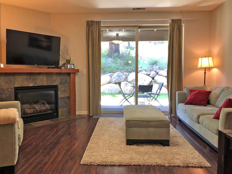 Living room facing patio and forest