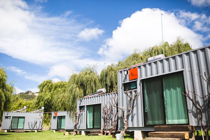 Nature escape in unique shipping container rooms!