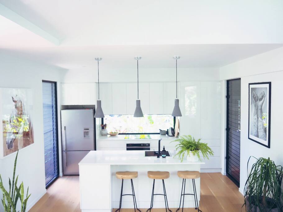 Kitchen. Well equipped and a pleasure to cook in with new and modern appliances including induction stove top, modern oven, fridge, freezer, microwave and dishwasher.