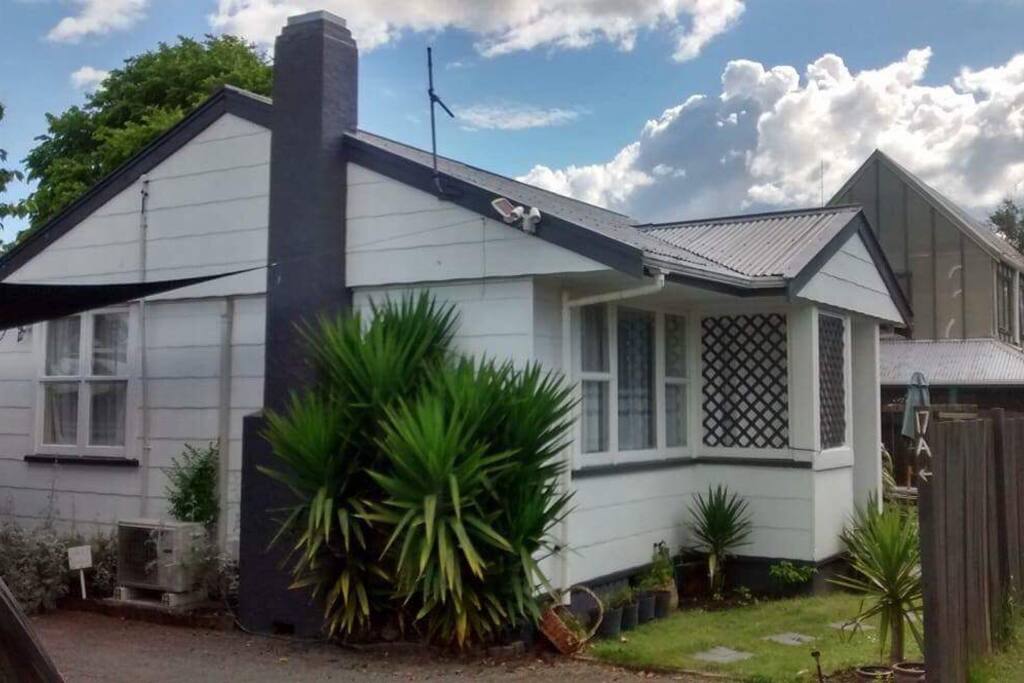 Front entrance and parking under the shade sail