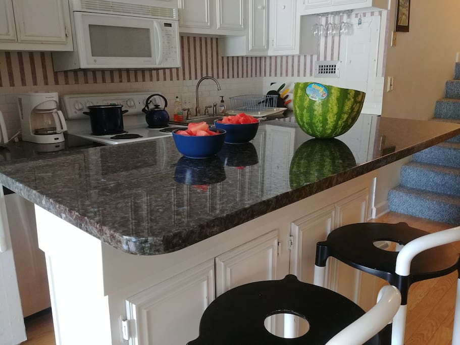 Full kitchen with new granite countertops and butcher block