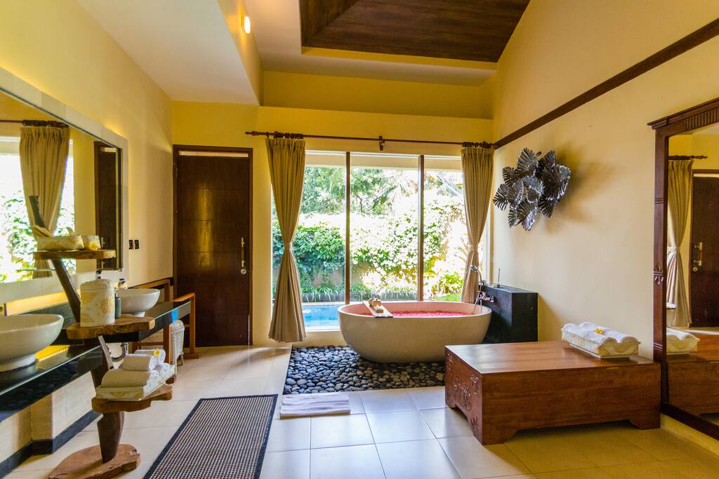 Bath tub with private pool view of one bedroom private pool villa