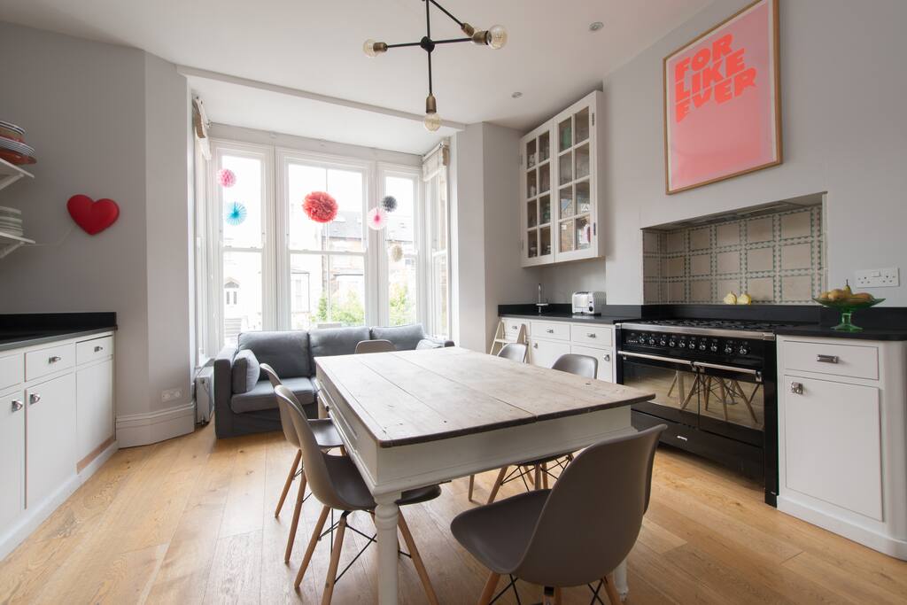 Kitchen with huge windows overlooking the street.