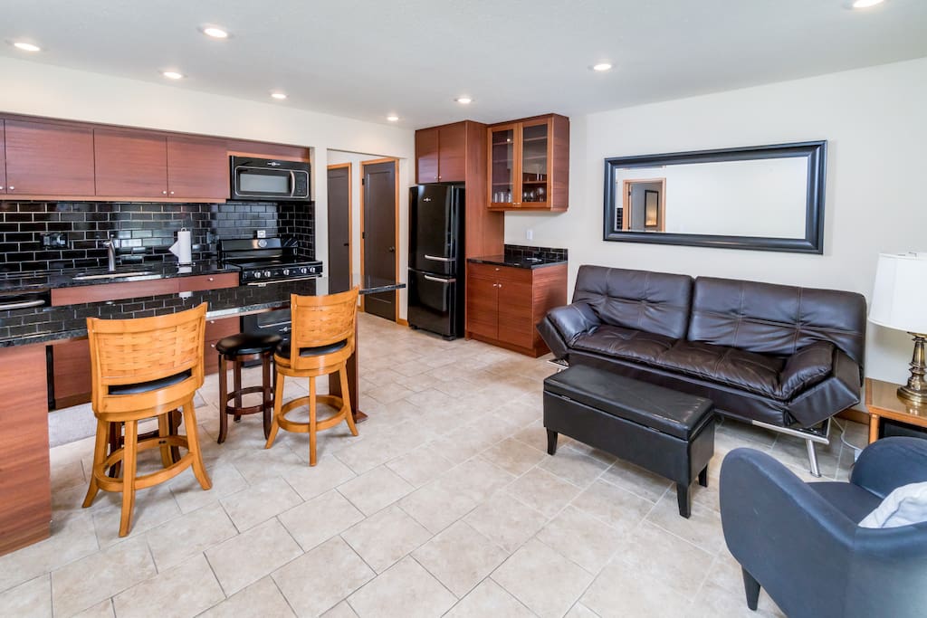 Open floor plan with welcoming living area. Professionally cleaned by TurnKey staff.