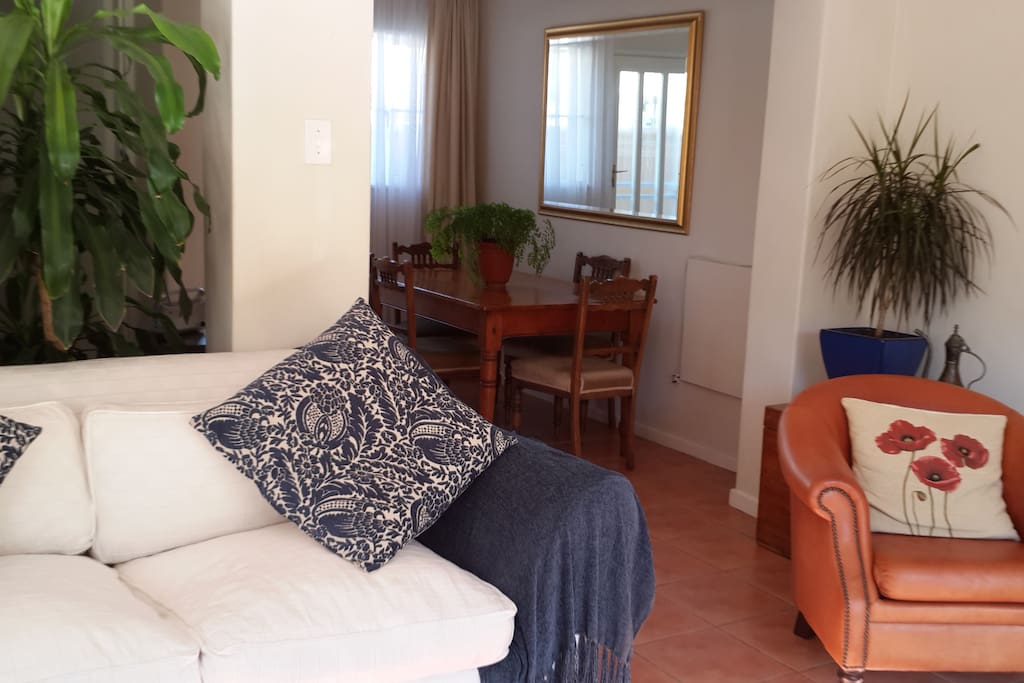 Lounge leading into separate dining room.
