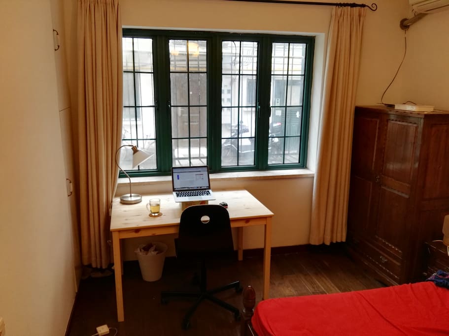 Nice, big bedroom with a working space