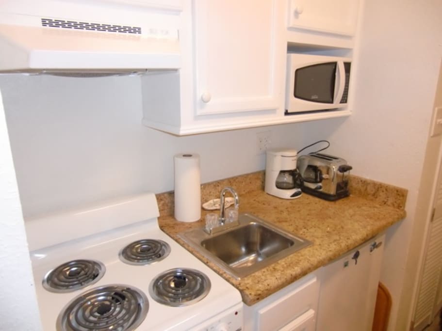 Small...and very modern kitchen.