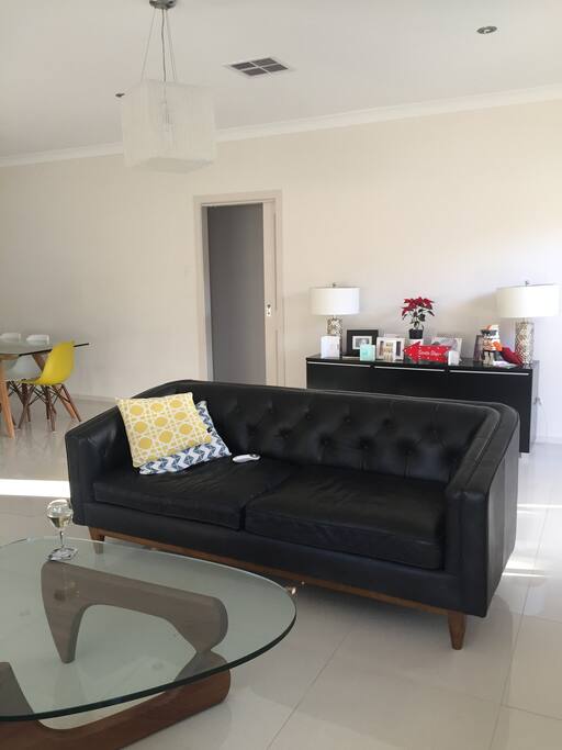 2 two seater sofas 42 in wall mounted tv great for movie watching or just a rest and a aperitif