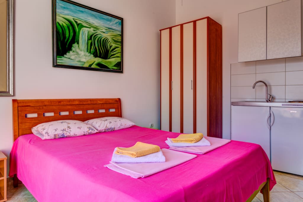 Take a moment to rest in this comfortable bed.