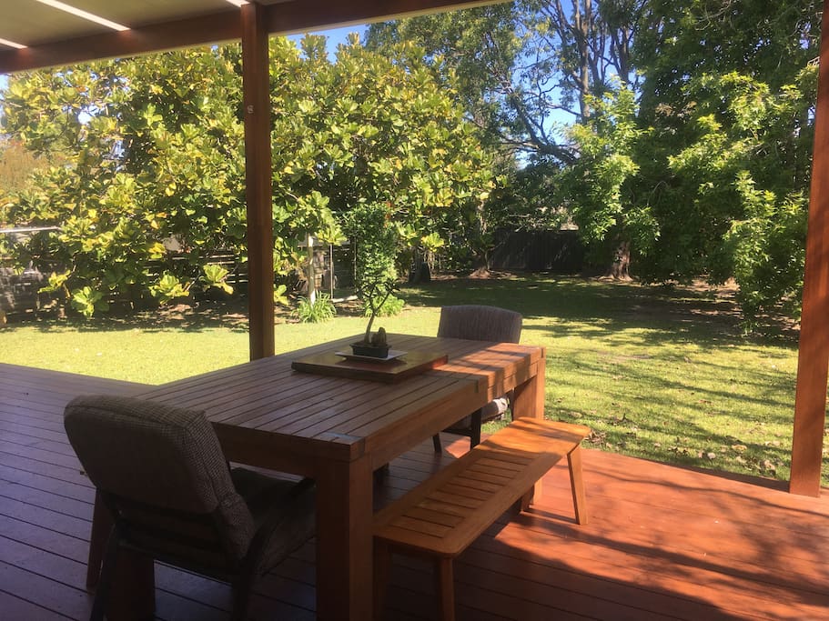 Large outdoor table to enjoy meals overlooking the garden