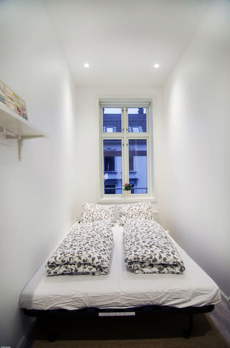 The pull-out sofa bed when made up. You will be provided with clean towels and bed-sheets. Also a duvet and pillow.
