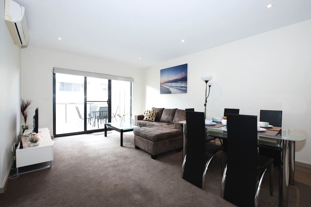 Open plan living, dining and work area - view from the entrace