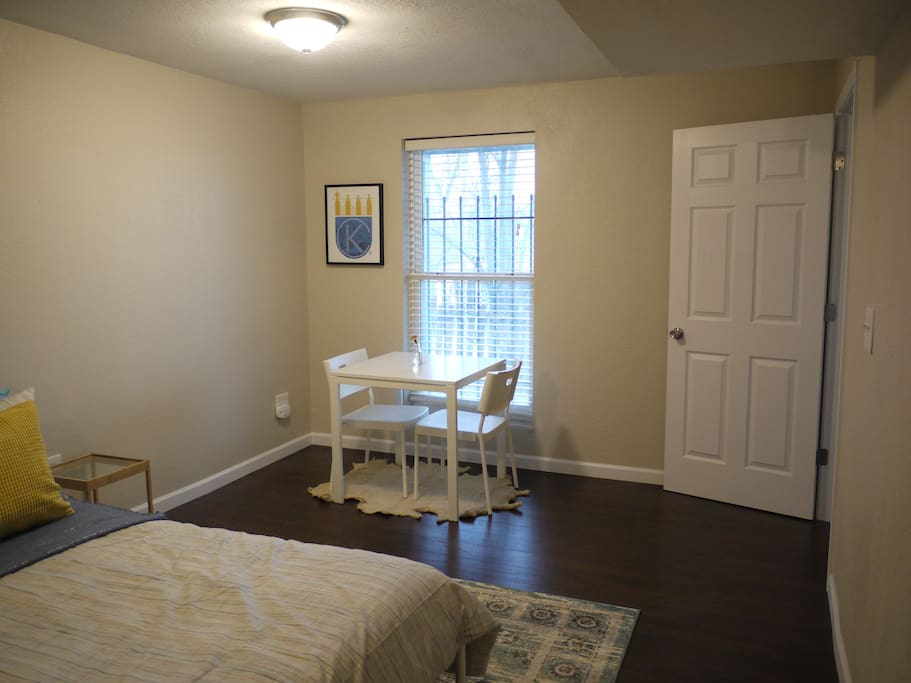 Desk/dining table/work space gets great light from the window!