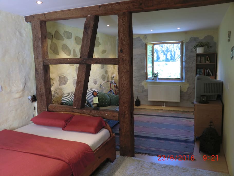 Historic flair with old wooden beams & natural stone walls