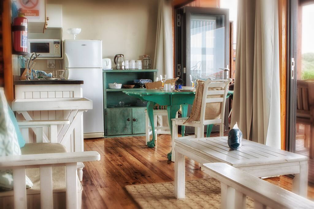 A view towards the kitchen and dining area.