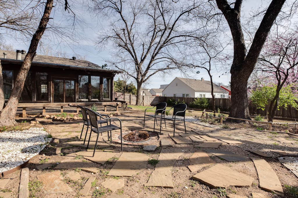 Gas fire pit in backyard