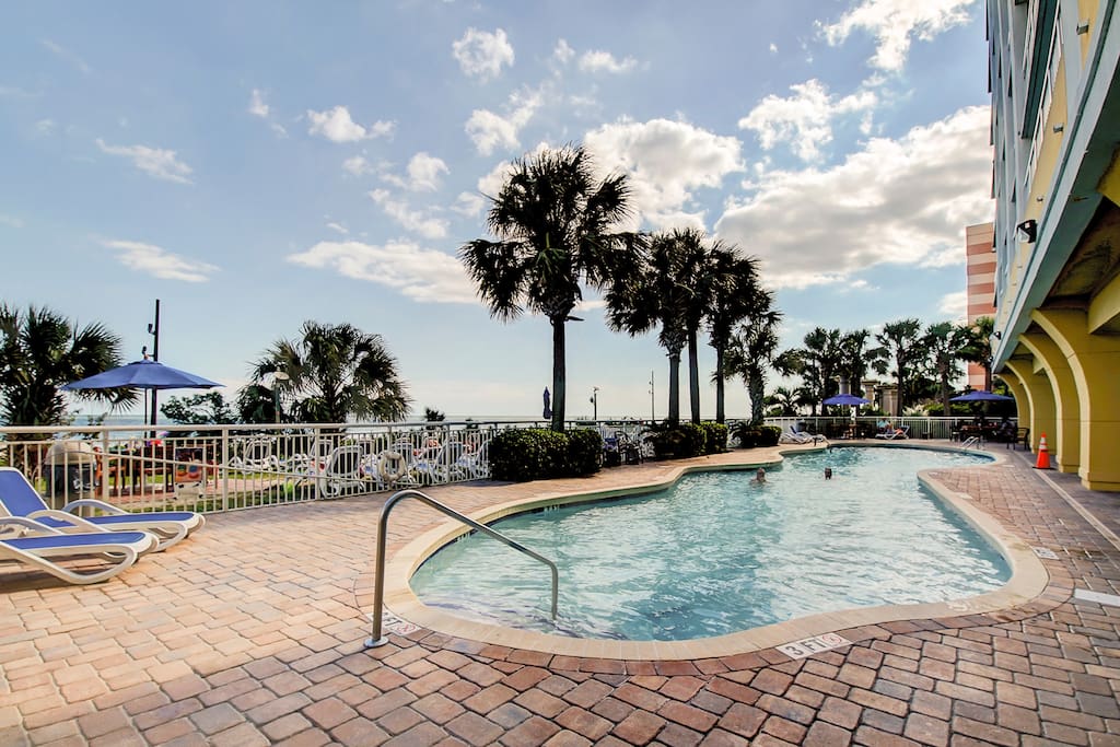 Overlooking the beach is the 60' outdoor pool with plenty of lounge chairs.