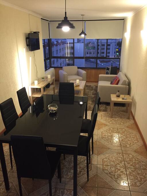 living comedor con vista bahia fuegos artificiales