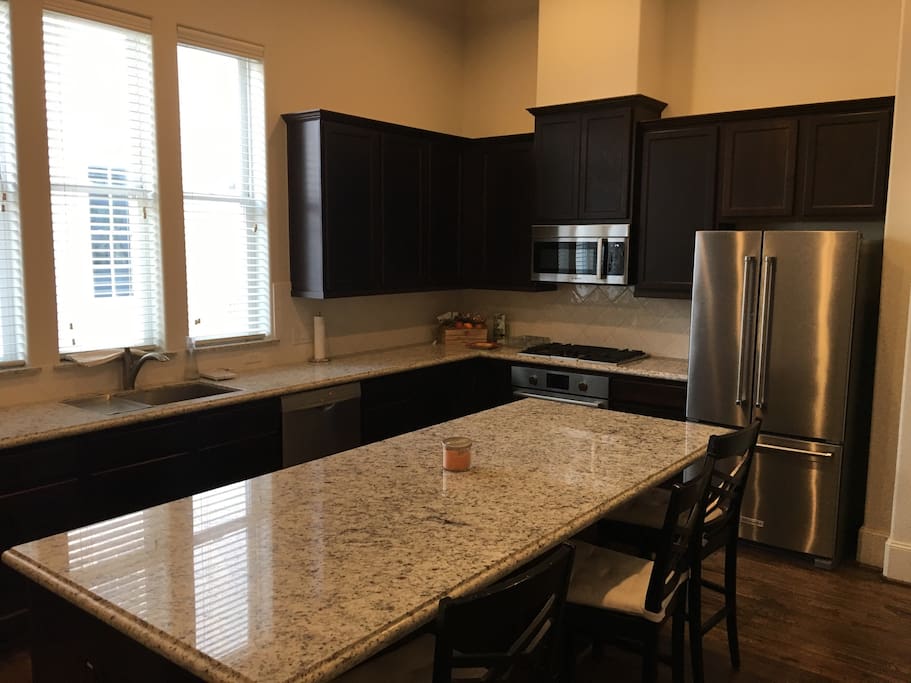 Huge kitchen with dining seating for 10 people.