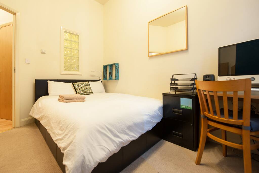 Bedroom with desk/workspace
