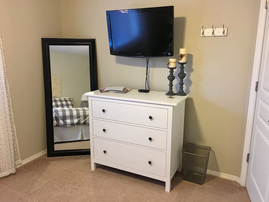 Unpack your clothes in the dresser or closet. The full-length mirror will ensure you're looking your best! HD TV will keep you entertained during your stay.