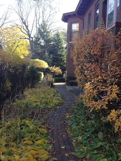 Walkway to apartment entrance at back of house