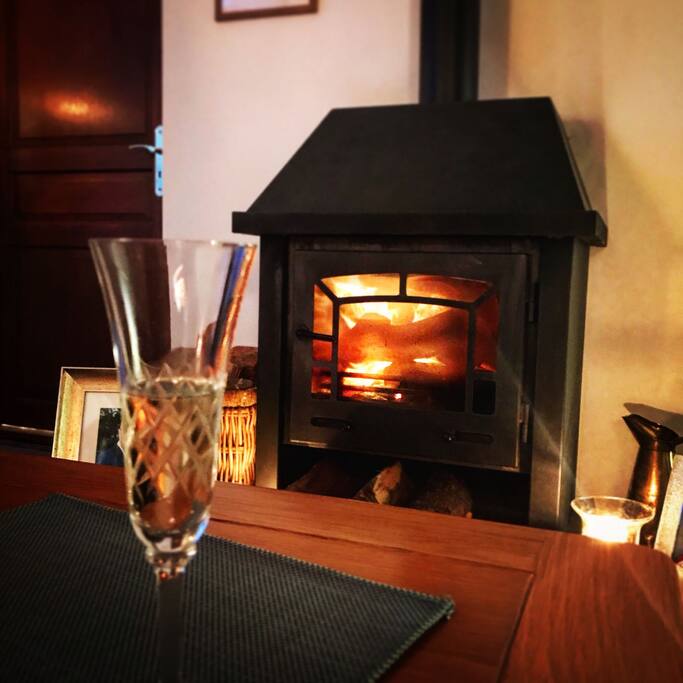 Feet up, relax by the log fire