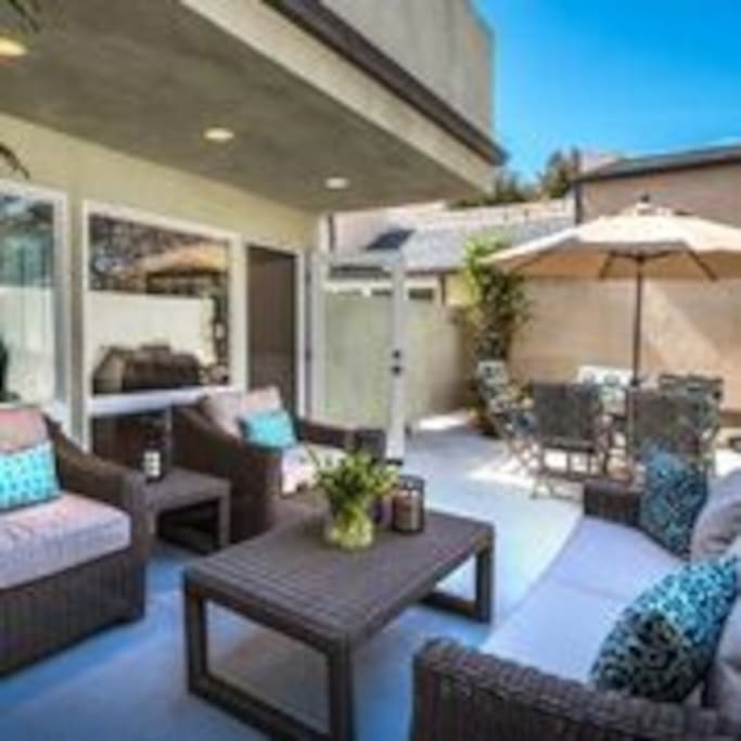 Large outdoor private patio with a BBQ and Table seating for 6