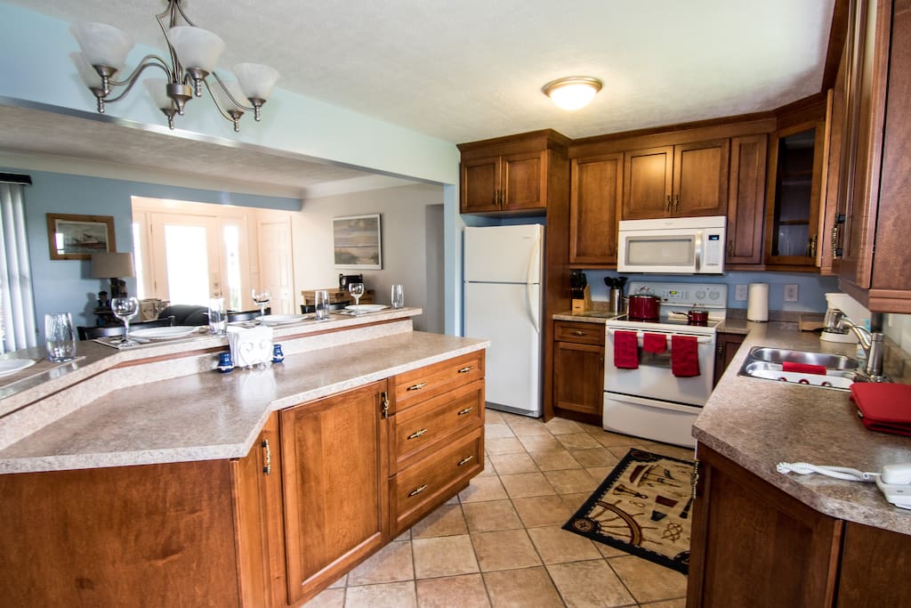 Bright, Open, Fully Equipped Kitchen With Dine-at Island