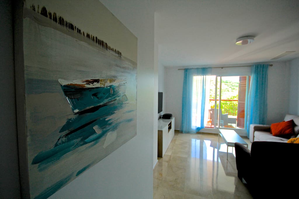 Living/dining room with the direct access to front balcony