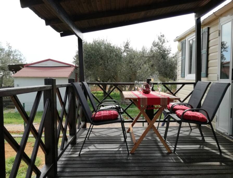 a terrace in front of the house