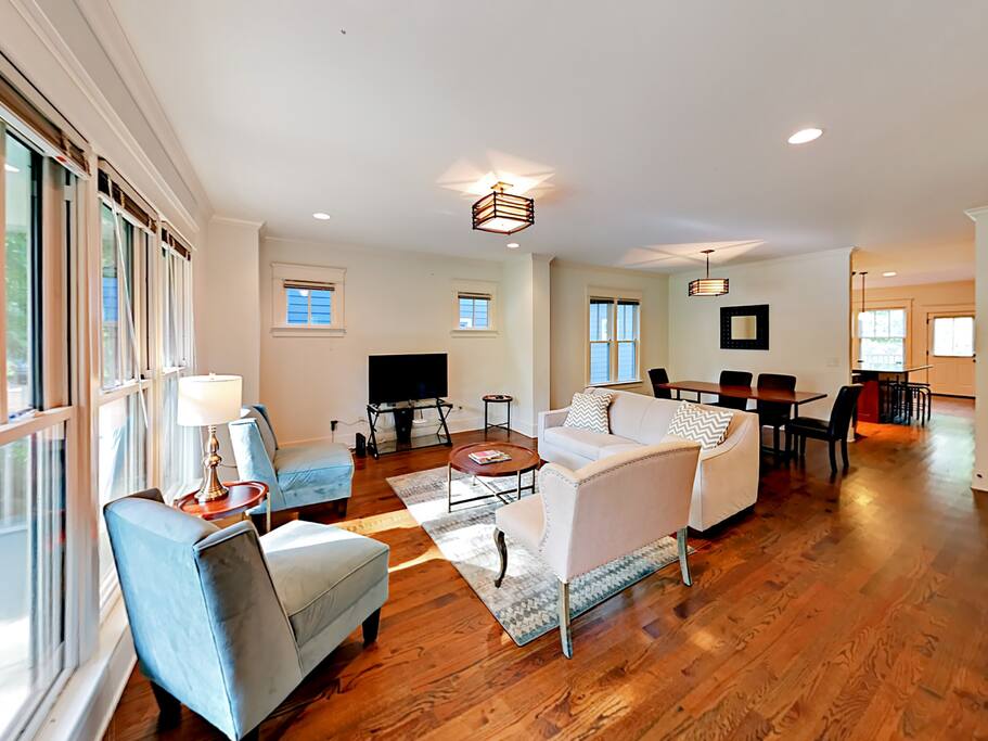 Chic furnishings and light-washed open space create a great place to gather!