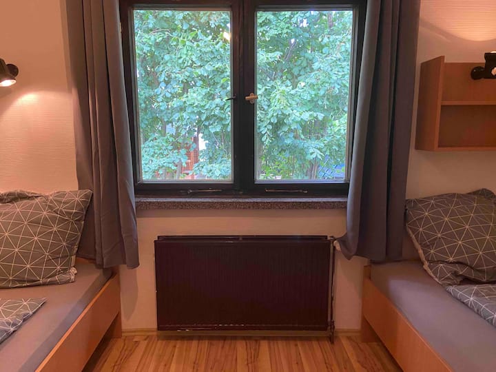 Room 3: 2 single beds with spacious closet, newly renovated; bathroom in the hallway