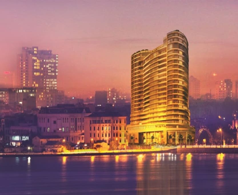 Building from the lake at night
