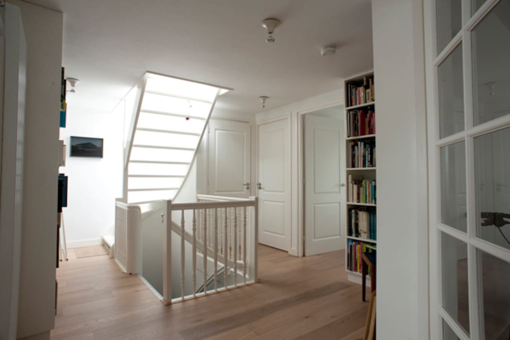 Hal and staircase with own library