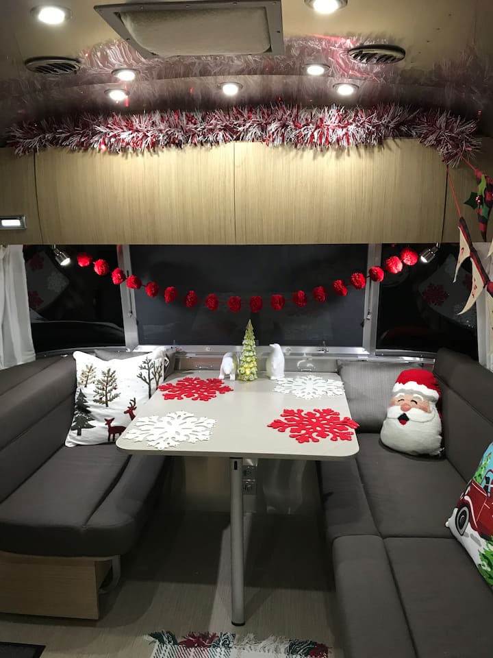 Dinette seats four and easily converts into an extra bed when needed.